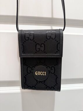 Gucci Black GG Supreme Crossbody Pouch with Gold Logo
